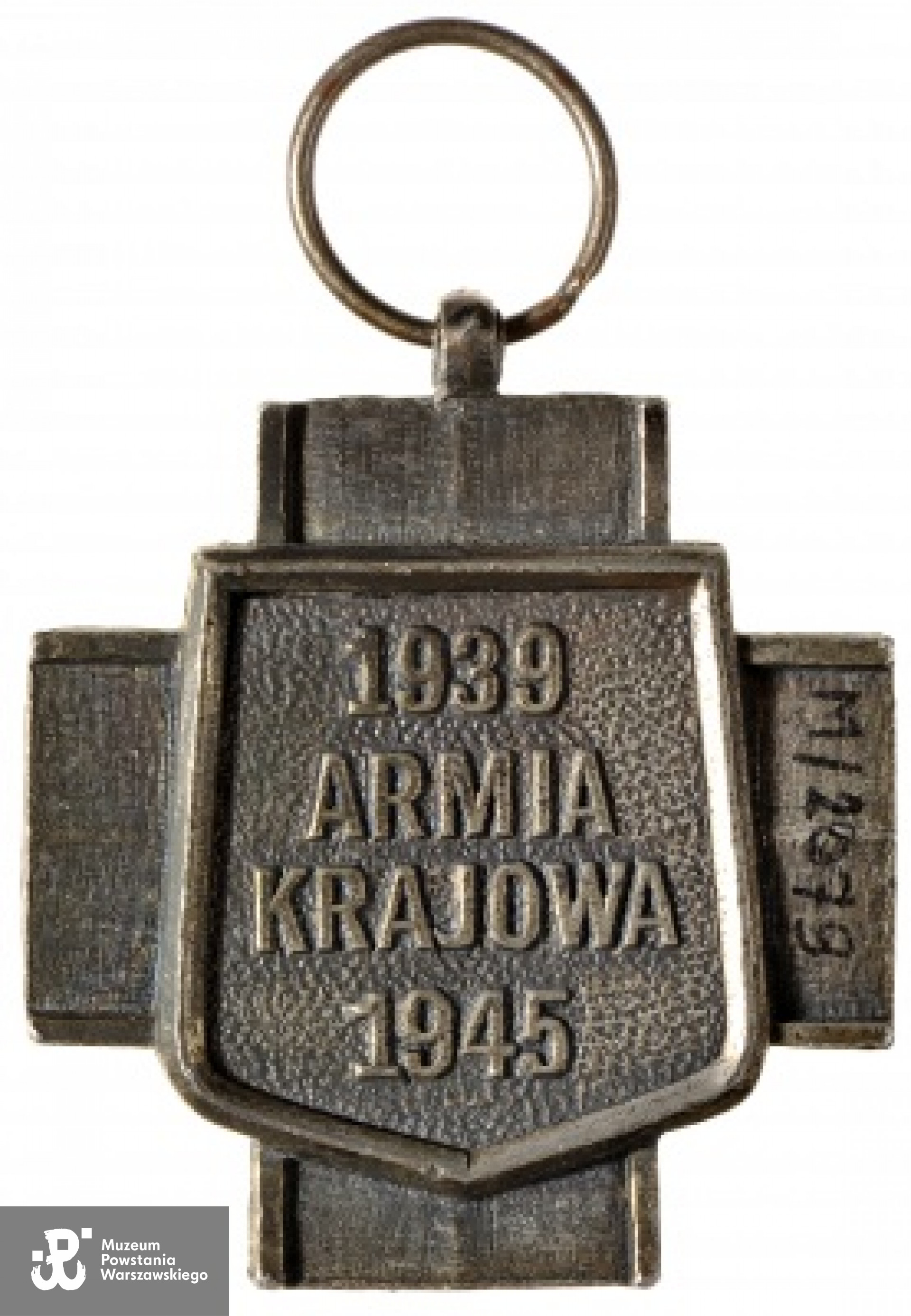 Krzyż Armii Krajowej nadany pośmiertnie mjr. Bolesławowi Kontrymowi ps. "Żmudzin". Bez wstążki, z metalową obręczą na wstążkę - rewers