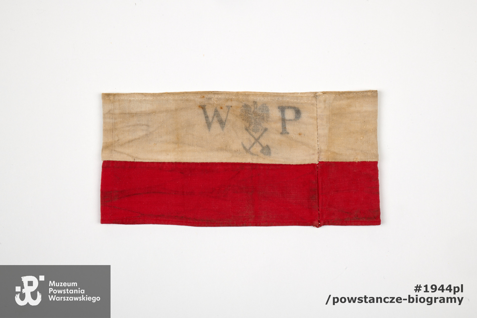 Opaska powstańcza (zszyta). Pochodzenie: zawartość portfela (P/5401)