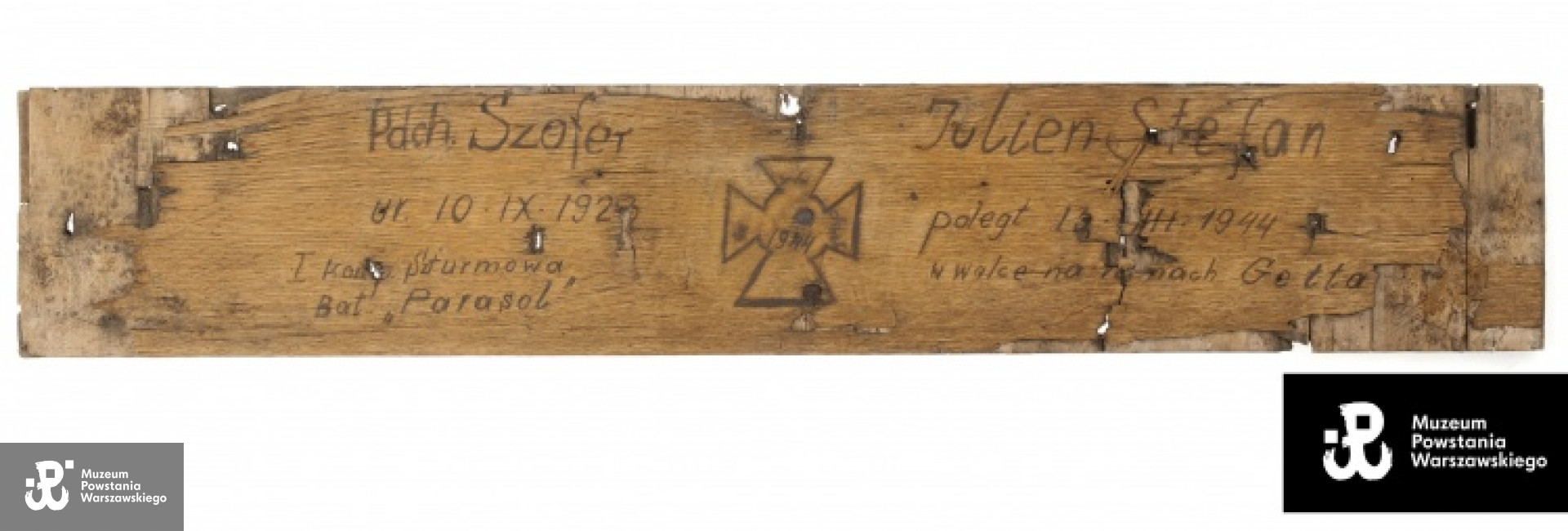 Deska z powstańczej mogiły Stefana - zbiory Muzeum Powstania Warszawskiego, ekspozycja stała.