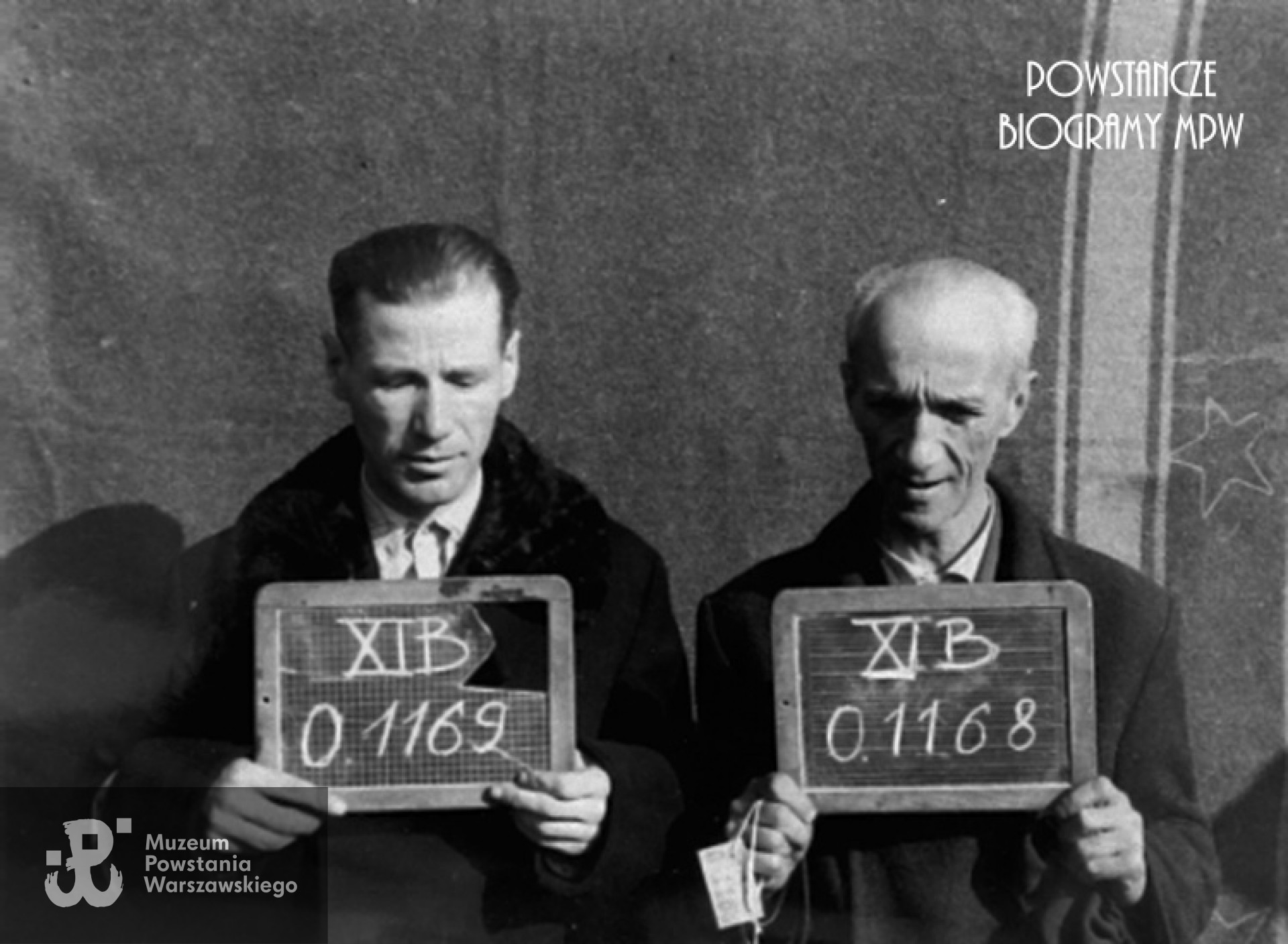 Fotografia z obozu jenieckiego w Fallingbostel (Stalag XI B) - 10 października 1944 r. Z numerem jenieckim . 0.1169 ks. ppłk. Jan Wojciechowski "Korab" kapelan, obok 0.1168 płk. Wiktor Szandorowski "Szpak". Fot. ze zbiorów Fototeki Muzeum Powstania Warszawskiego, sygn. <a href=" http://www.1944.pl/galerie/fototeka/foto/5631/autor/110"> MPW-IP/4429</a>