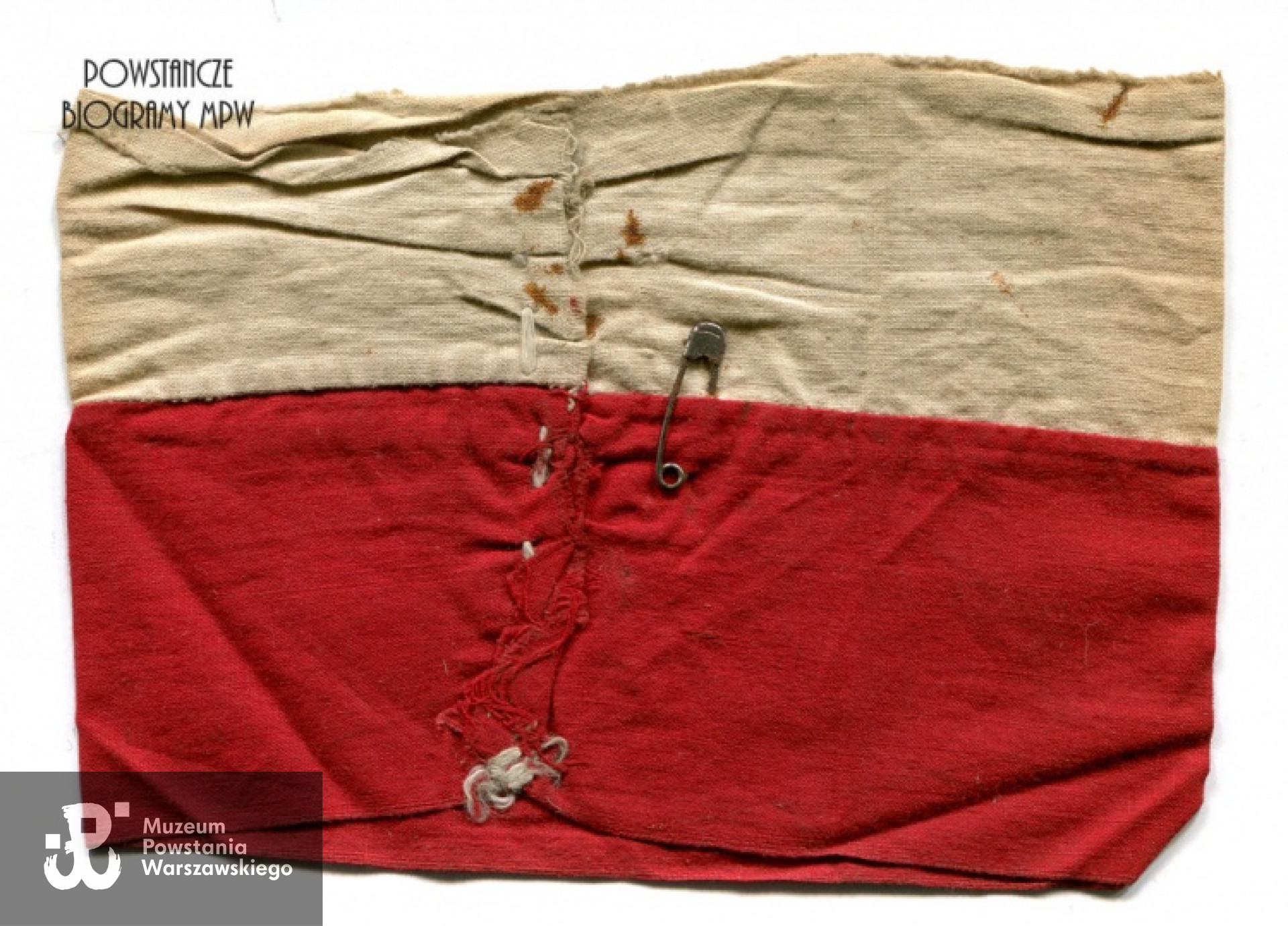 Zachowana opaska powstańcza Bolesława Buczkowskiego "Bolka" - pamiątka po szlaku bojowym : Wola -  Żoliborz - Stare Miasto - Czerniaków. Archiwum rodzinne Haliny Buczkowskiej