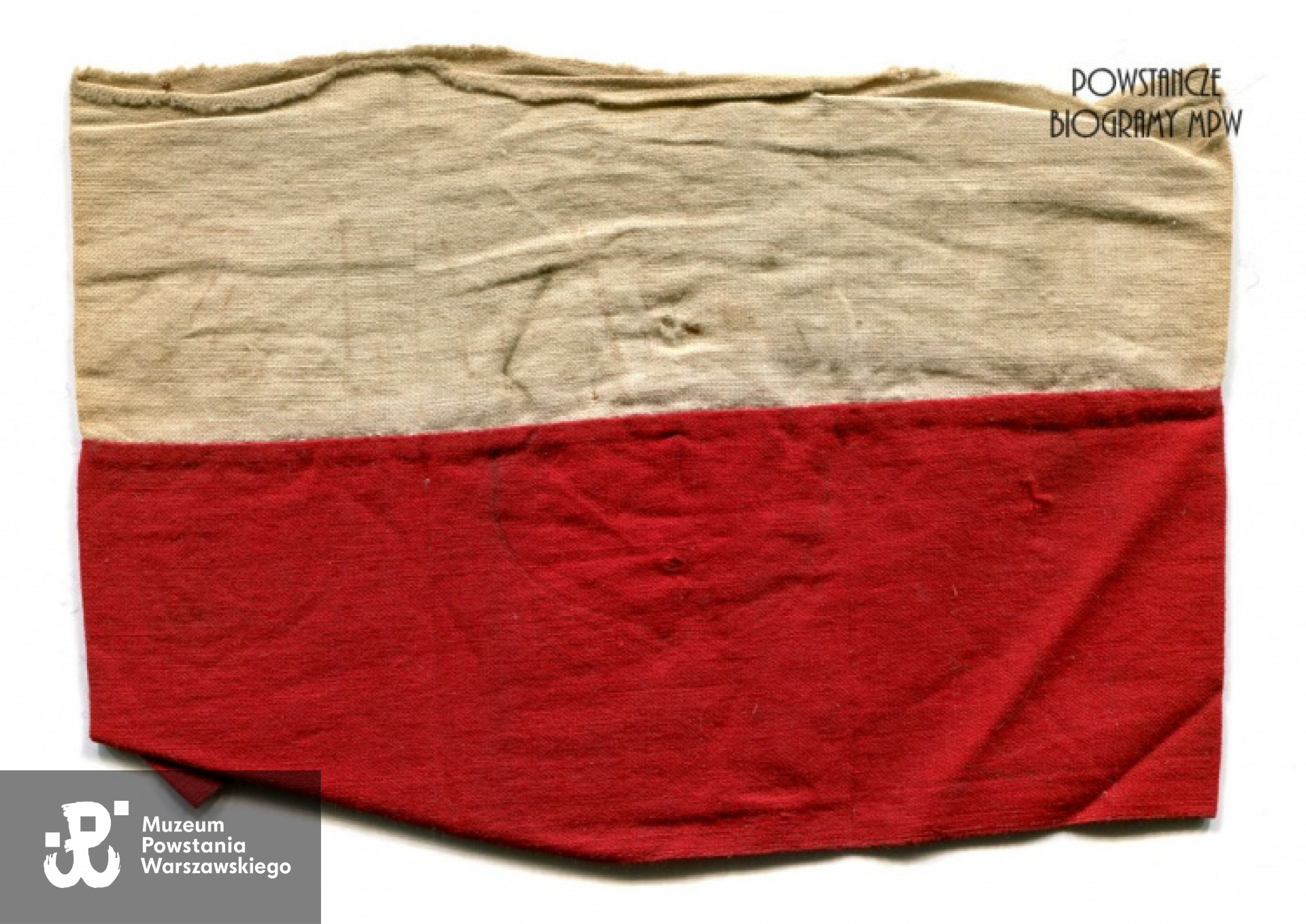 Zachowana opaska powstańcza Bolesława Buczkowskiego "Bolka" - pamiątka po szlaku bojowym : Wola - Stare Miasto - Śródmieście - Czerniaków. Archiwum rodzinne Haliny Buczkowskiej