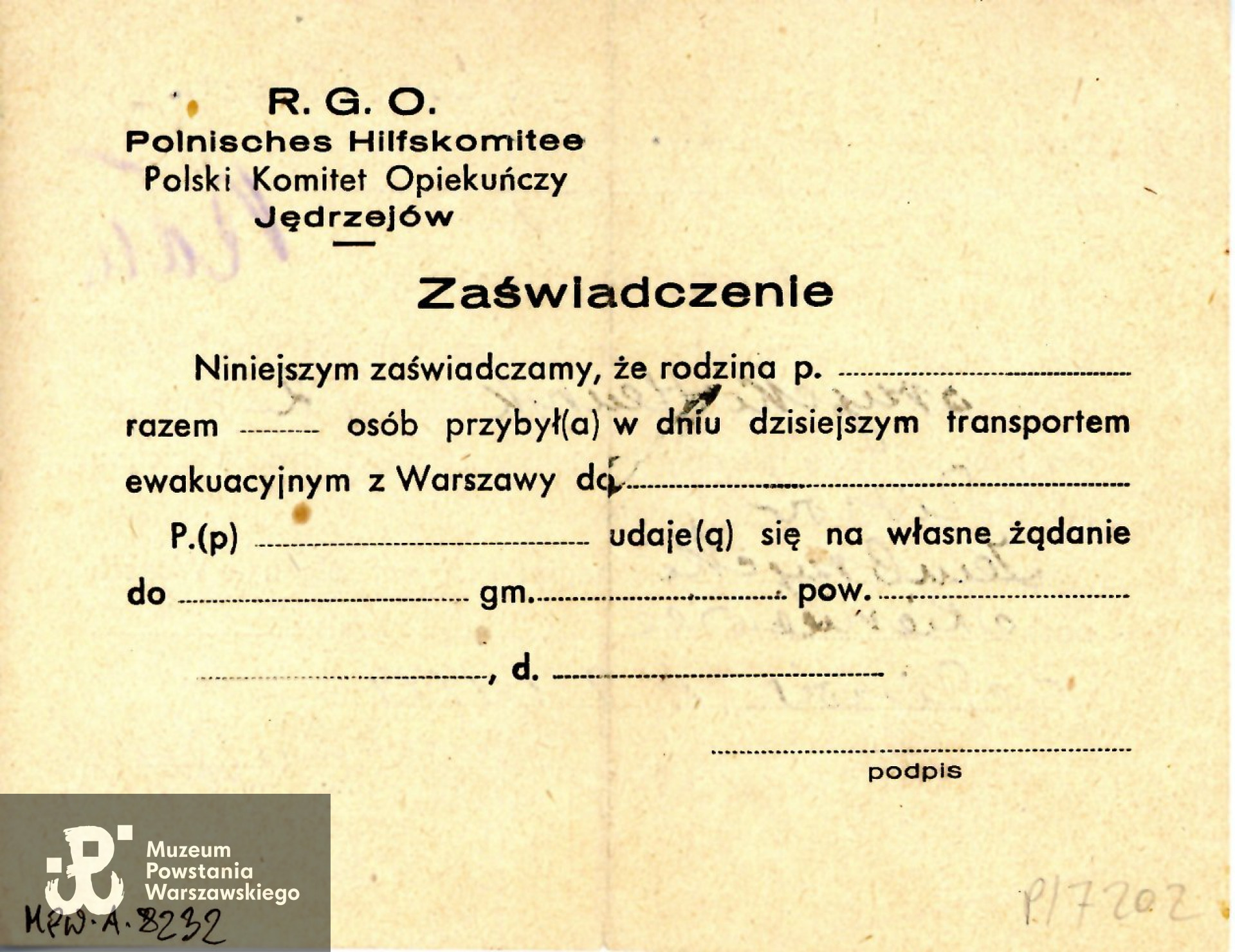 Zaświadczenie  (niem. Bescheinigung) wystawione przez RGO w Jędrzejowie dla przybyłego transportem z Warszawy Henryka Zembrzyckiego. Dokument w języku polskim i języku niemieckim. Ze zbiorów Muzeum Powstania Warszawskiego, sygn. MPW-A-8232
