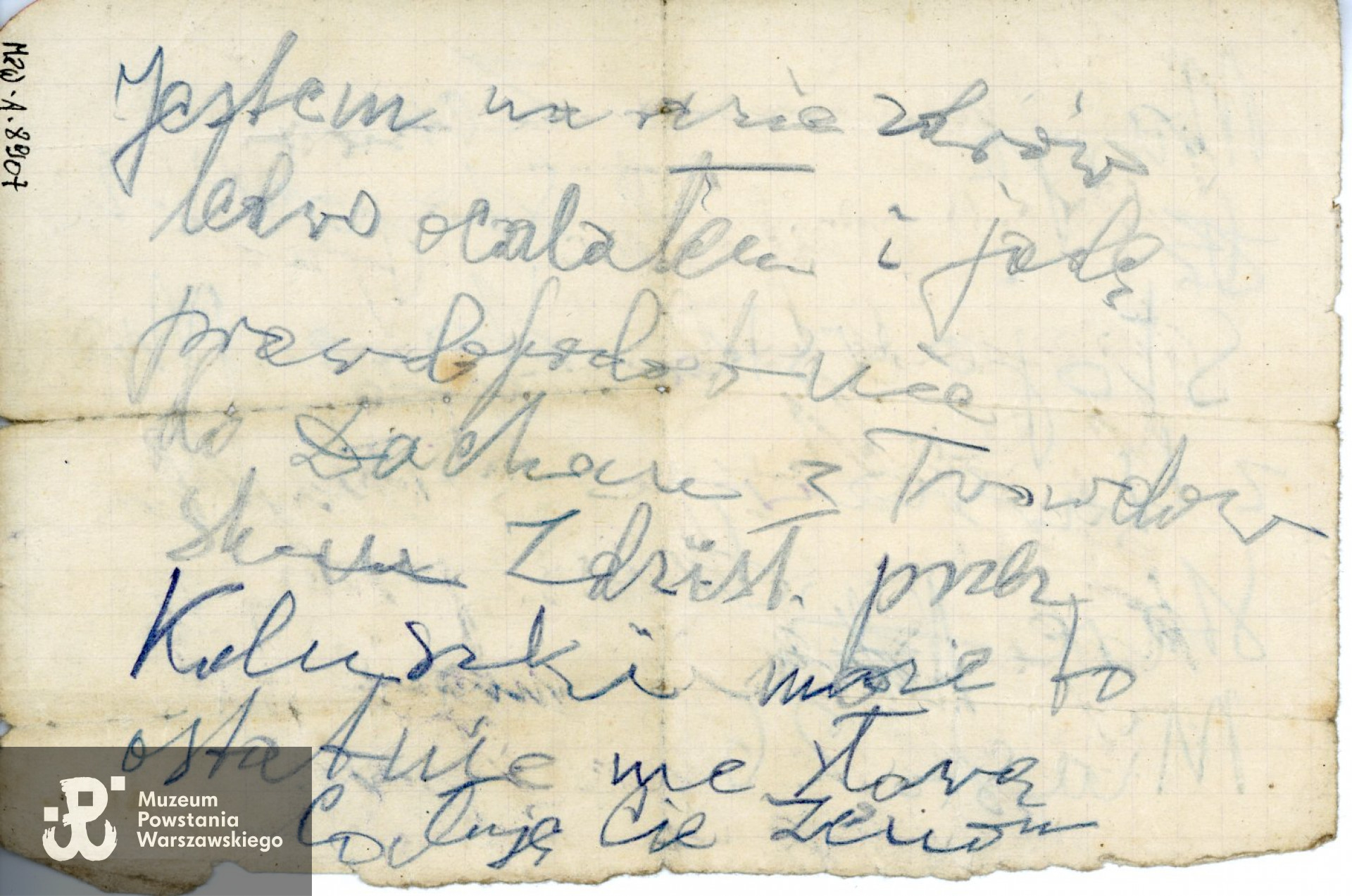 Kartka wyrzucona z transportu w Koluszkach, napisana przez Zenona Stojowskiego do żony - Marii z informacją, że jedzie do Dachau, ze zbiorów Muzeum Powstania Warszawskiego nr inw. MPW-A-8907